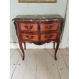 Kingwood chest the marble above two long drawers with metal mounts, raised on shaped legs. { 74cm