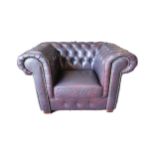 Deep buttoned leather upholstered Chesterfield club chair. { 74cm H X 115cm W X 90cm D }.