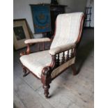 19th. C. Upholstered mahogany open armchair raised on tapered reeded legs, in need of some repairs {