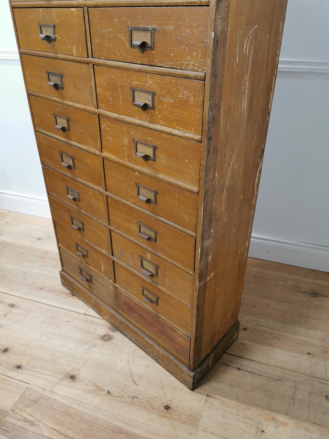 Early 20th. C. painted pine bank of twenty five short drawers with original handles, raised on - Image 2 of 7