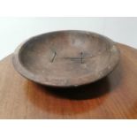 19th. C. yew wood butter bowl with metal stitching { 7cm H X 29cm Dia }.