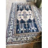 Decorative Oriental tribal carpet square {240 cm L x 146 cm W}.