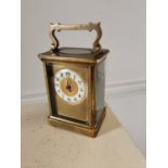 19th C. brass carriage clock. { 14 cm H x 8 cm W x 6 cm D}.