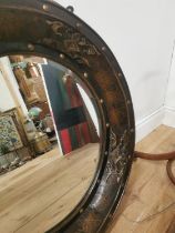 Decorative wall mirror mounted in leather frame {82cm Dia.}