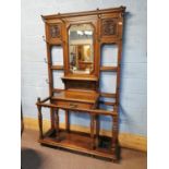 Edwardian carved oak hat and coat stand {210cm H X 124cm W X 41 cm D}.