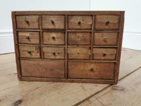 Early 20th. C. pine watch maker's drawers, the twelve short drawers over two deep drawers.. { 23cm H