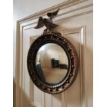 19th. C. gilt convex wall mirror surmounted with an eagle { 90cm H X 61cm W }.