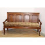 19th. C. oak settle with upholstered cushion raised on Queen Ann style legs { 106cm H X 183cm W X