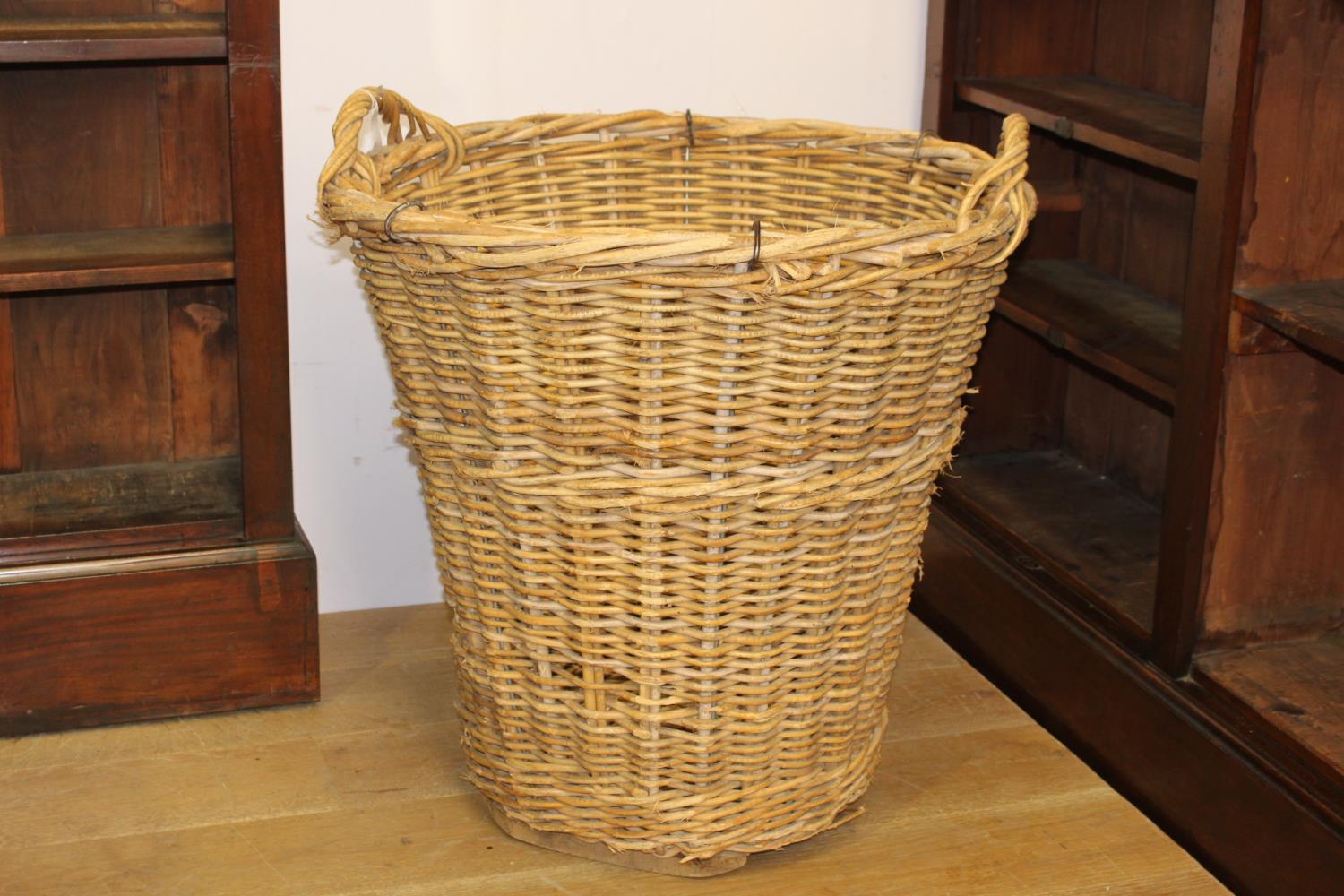 Wicker laundry/ log basket { 80cm H X 60cm Dia }.