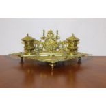 Decorative brass inkwell with ceramic pots { 14cm H X 40cm W X 22cm D }.