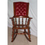 19th. C. oak rocking chair with deep buttoned leather upholstered back { 108cm H X 64cm W X 48cm
