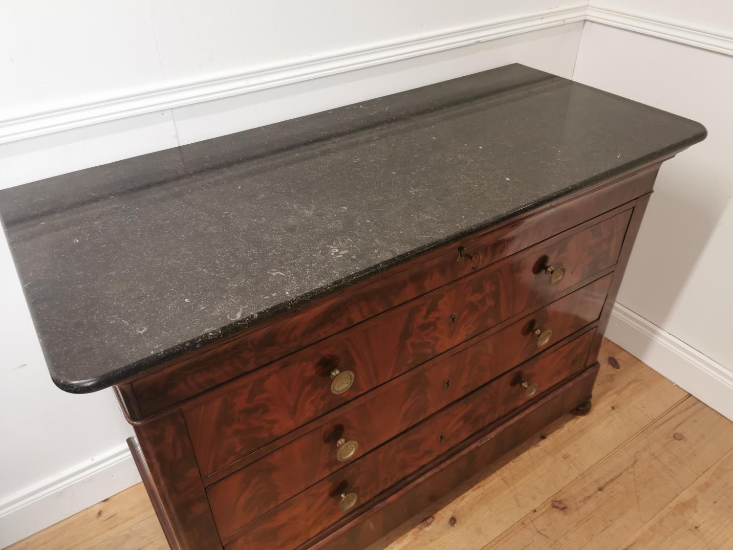 19th. C. flamed mahogany chest the marble top above four long drawers raised on bun feet { 90cm H - Image 2 of 6
