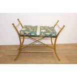 Brass window seat with upholstered seat the frame in the style of bamboo. { 52cm H X 63cm W X 32cm D