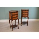 Pair walnut and rosewood ormolu mounted lamp tables with three drawers raised on shaped legs {