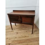 Edwardian mahogany dressing table the gallery back above two panelled doors raised on square