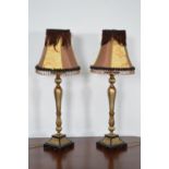 Pair of gilded metal table lamps with shades. { 80cm H X 28cm Dia }.