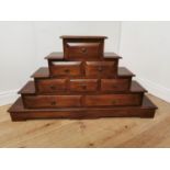 Unusual mahogany cabinet with a single drawer over two drawers over three drawers over two long