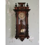 19th C. mahogany Vienna wall clock with brass and painted dial {135 cm H x 48 cm W x 20 cm D}.