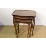 Nest of three walnut veneer tables { 54cm H X 57cm W X 43cm D }.