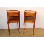Pair of walnut bedside lockers the gallery back above a single drawer and open shelf raised on