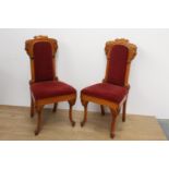 Pair of upholstered oak hall chairs raised on shaped legs { 110cm H X 51cm W X 45cm D }.