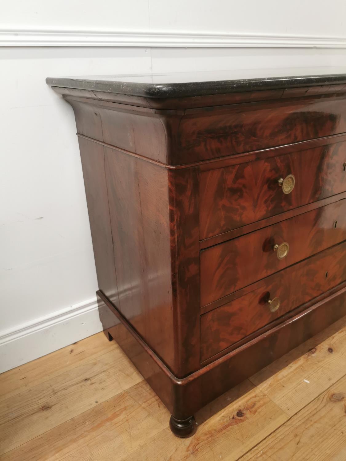 19th. C. flamed mahogany chest the marble top above four long drawers raised on bun feet { 90cm H - Image 3 of 6
