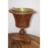 Walnut ice bucket with brass liner { 50cm H X 35cm Dia }.