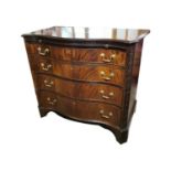 Neat serpentine mahogany chest the brushing slide above four graduated long drawers raised on