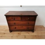 19th. C. mahogany chest of drawers with two short drawers over two long drawers raised on bun