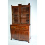 Regency mahogany secretaire bookcase the two astragal glazed doors above a fall front drawer