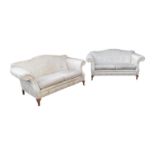 Pair of upholstered two seater camel backed settees raised on cabriole mahogany legs { 88cm H X