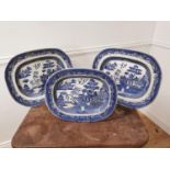 Three 19th C. Blue and White Willow pattern platters {46cm L x 39cm W Largest / 40cm L x 33cm W