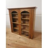 Pine wall cabinet with two glazed doors { 125cm H X 130cm W X 30cm D }.