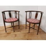 Pair of Edwardian mahogany arm chairs with upholstered seats raised on tapered legs {71 cm H x 53 cm