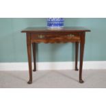 19th C. walnut console table with single drawer in the frieze raised on tapered legs and pad