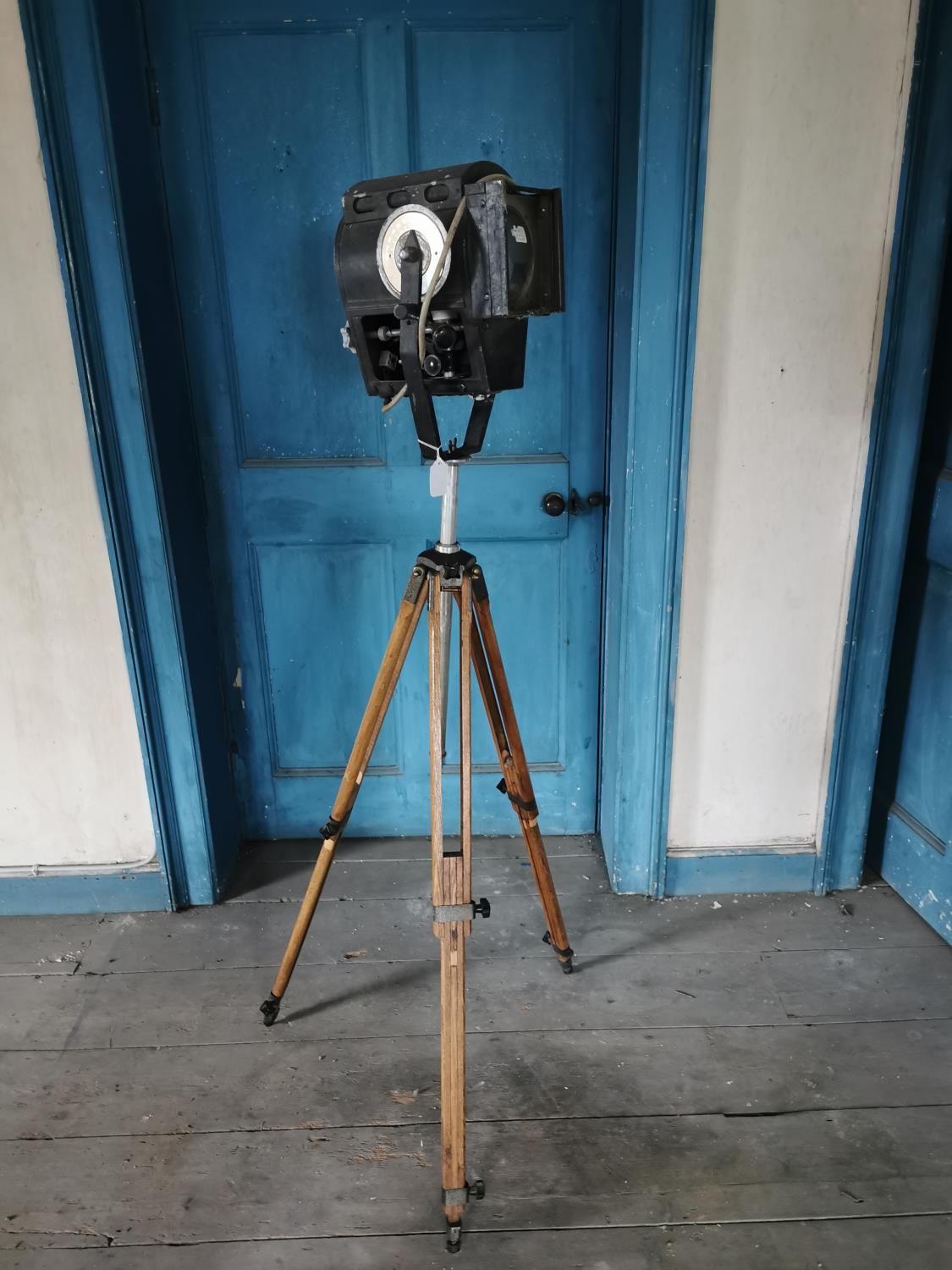 Theatre light mounted on a wooden tripod { 162cm H }.