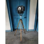 Theatre light mounted on a wooden tripod { 162cm H }.