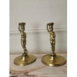 Pair of brass candlesticks in the form of an Egyptian lady and gent { 33cm H X 19cm Dia. }