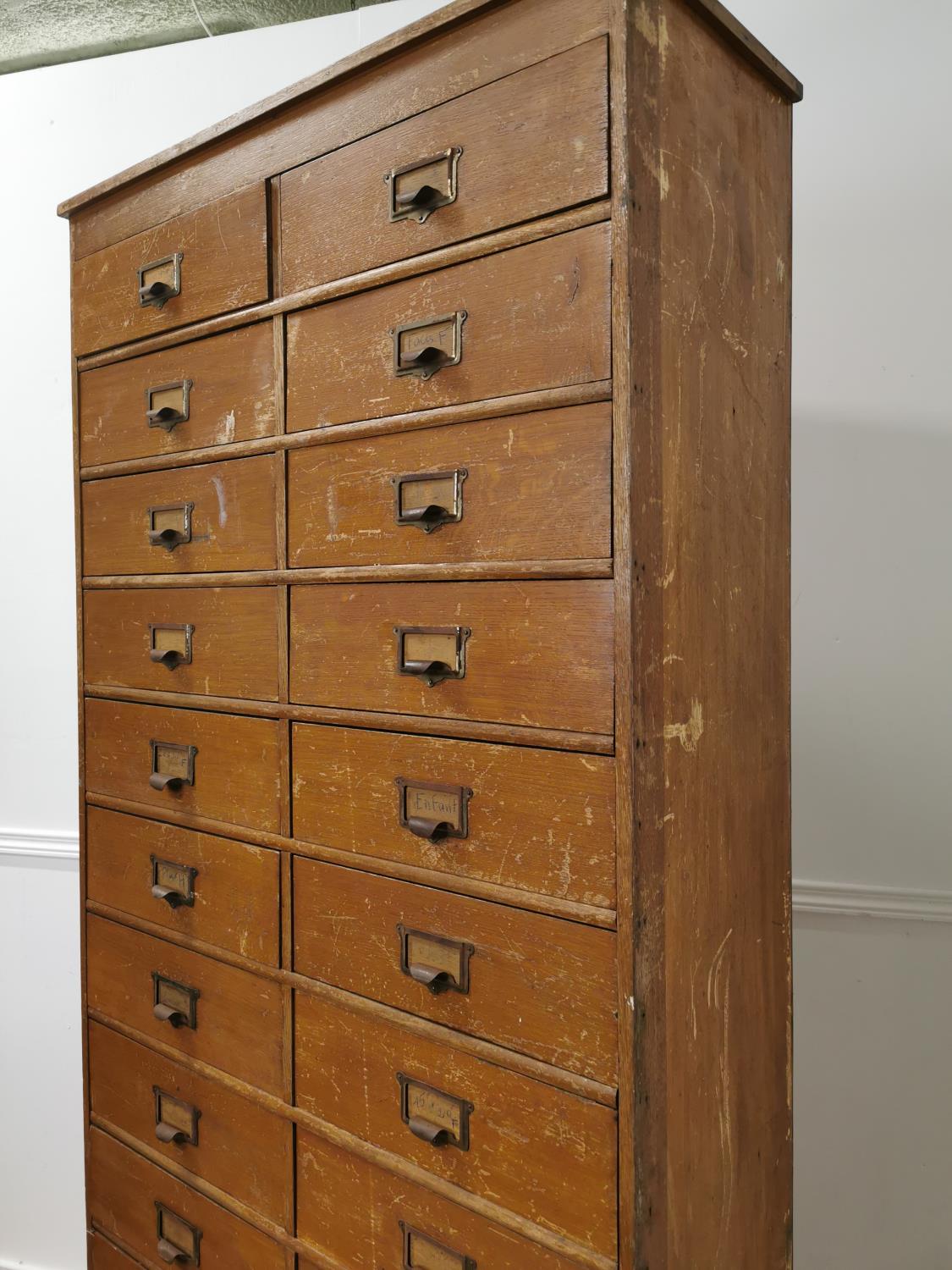 Early 20th. C. painted pine bank of twenty five short drawers with original handles, raised on - Image 3 of 7