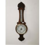 19th. C. carved oak Aneroid barometer{ 83cm H X 26cm W }.