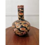 Oriental ceramic onion vase decorated with flowers and dragons { 33cm H X 20cm Dia }.