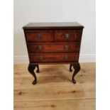 Mahogany and satinwood inlaid side cabinet with two short drawers over two long drawers raised on