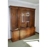 Mahogany breakfront bookcase the four astragal glazed doors above four panelled doors raised on