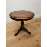Mahogany lamp table raised on turned column and three outswept legs { 60cm H }.