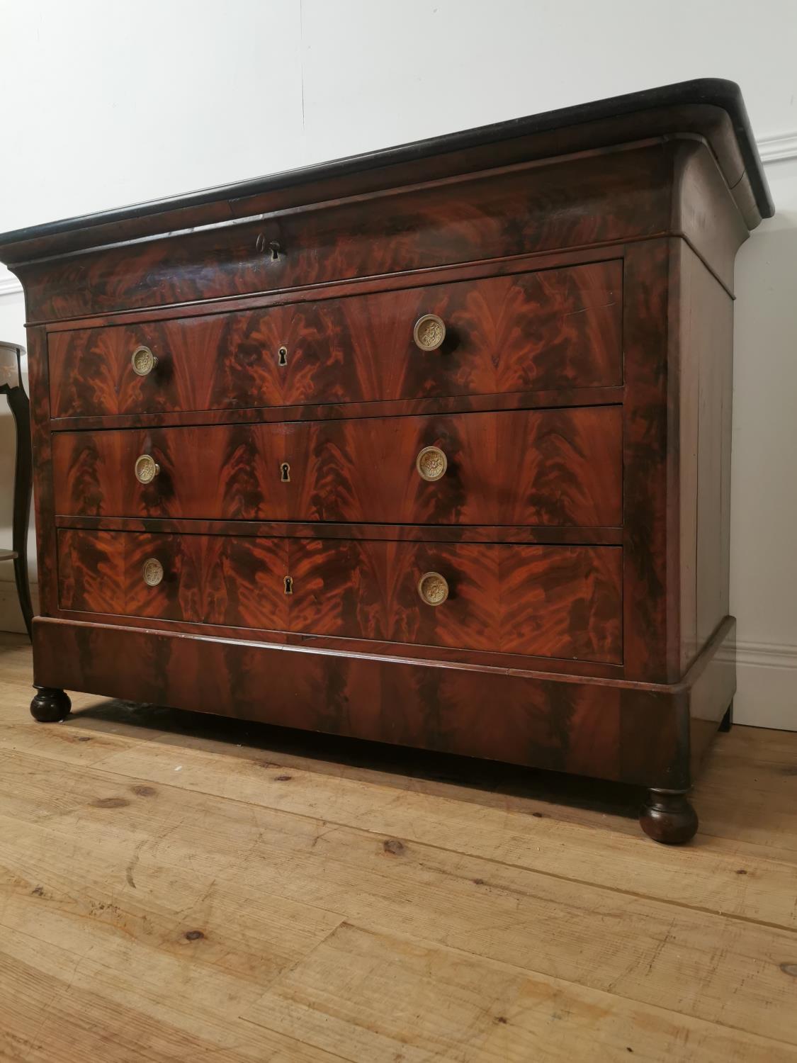 19th. C. flamed mahogany chest the marble top above four long drawers raised on bun feet { 90cm H - Image 6 of 6