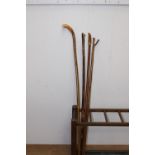 Collection of four hiking/ walking sticks { 138cm H }.