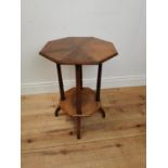 Edwardian oak lamp table with segment top raised on turned columns and platform base {69 cm H x 48