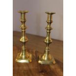 Pair of 19th. C. brass candlesticks { 26cm H X 6cm Sq }.