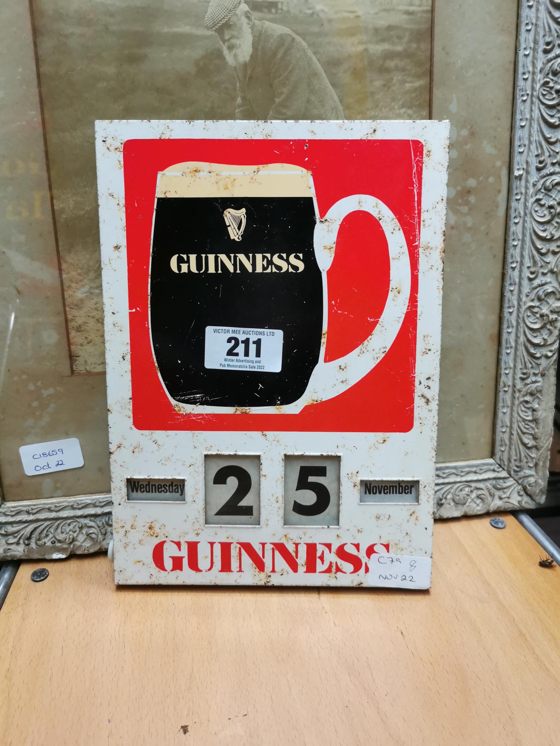 Guinness tin plate advertising calendar {20 cm H x 28 cm W}.