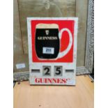 Guinness tin plate advertising calendar {20 cm H x 28 cm W}.
